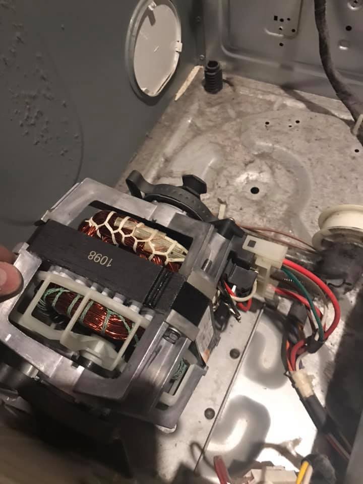 Dryer drive motor being tested during a repair in San Diego